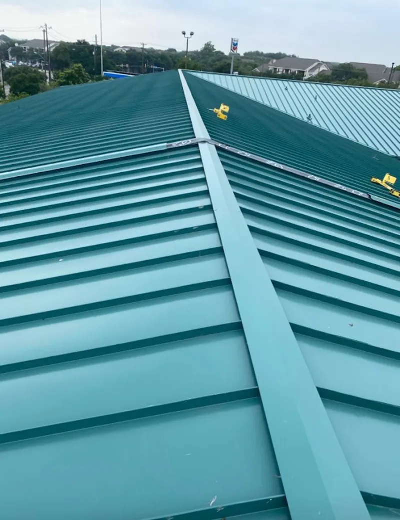 Green commercial metal roof ridge and valley for Metal Roof Repair in Lower Burrell